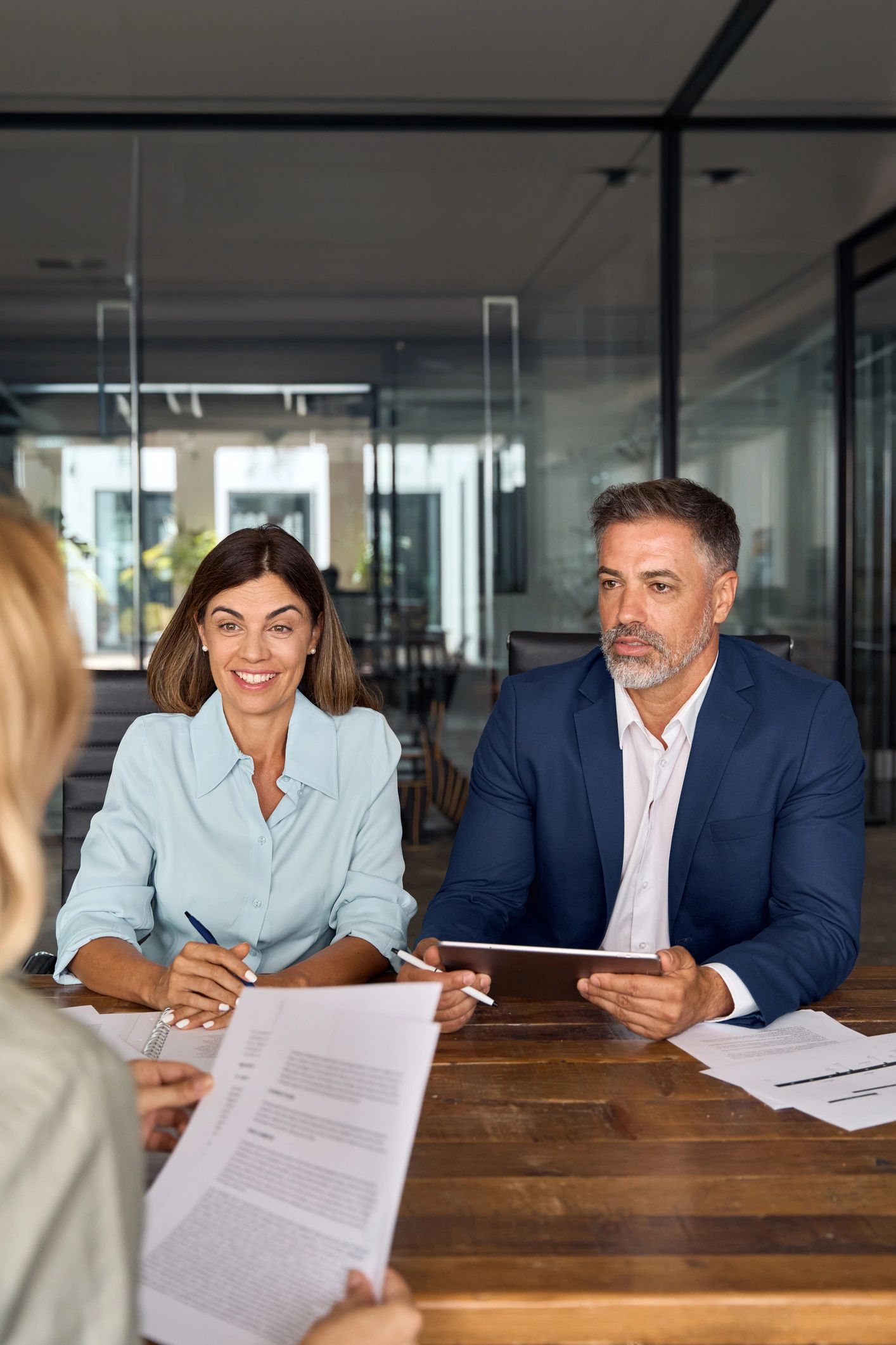 Business insurance team in discussion